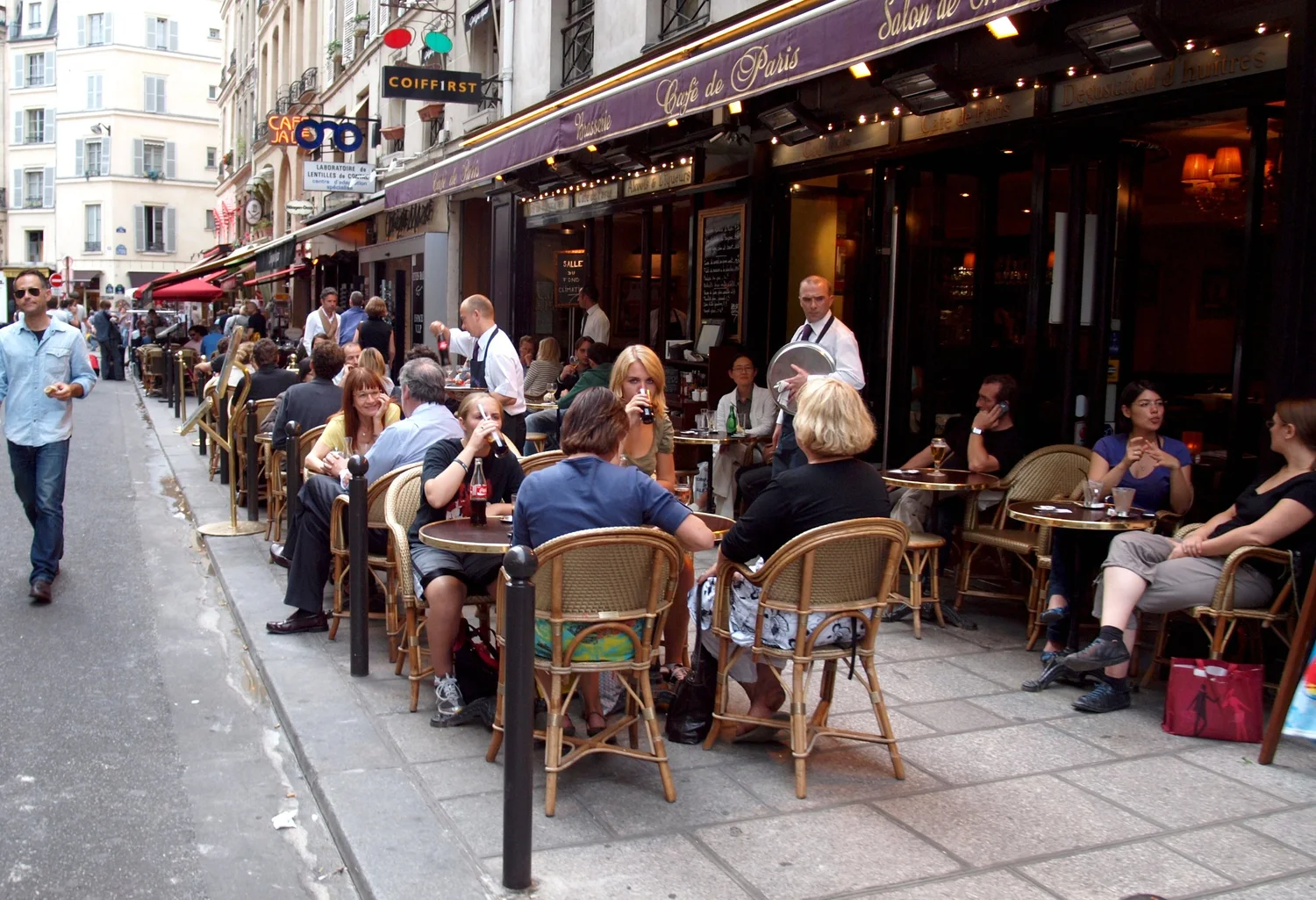 Outdoor café tables and diners in Saint-Germain-des-Prés
